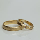 Faceted duet wedding rings