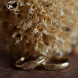 Marquise & half round finger prints wedding rings