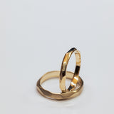 Faceted Wedding Ring Set with Flowing Movement