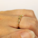 Twinkling Wavy Cluster With Light Green Saphhires
