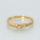 Tapered Cracked Earth Ring With White Diamond