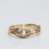 Large serpentine branch ring with diamond and sapphire