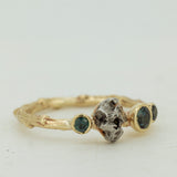 Meteorite & sapphires cluster ring