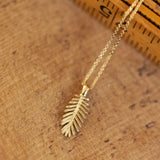 Palm tree gold pendant