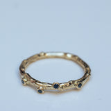 Branch Ring with Scattered Bubbles of Black Diamonds