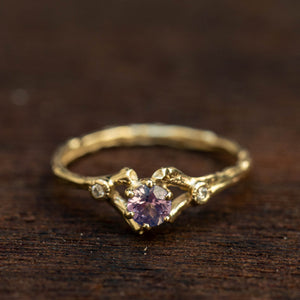 Spreading branch with purple sapphire and diamonds