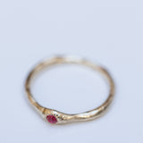 Raw ring with buried Ruby