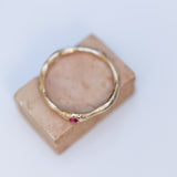 Raw ring with buried Ruby