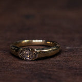 Narrowing raw oval diamond ring