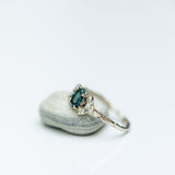 Symmetrical spreading branch ring with oval sapphire