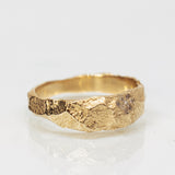 Wide Gold Band with Cracked Earth Texture and Buried Diamonds