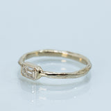 Raw Ring with a Horizontal Emerald Cut Lab-Grown Diamond