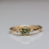 Green sapphire solitaire branch ring