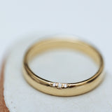 Wedding ring with hidden diamonds