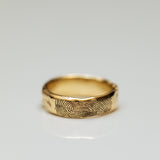 Raw finger print ring with diamonds