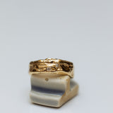 Raw finger print ring with diamonds