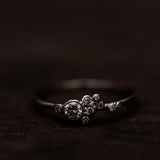 Asymmetric spread white diamonds bubble ring