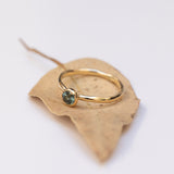 Raw bezel gold ring with Parti sapphire