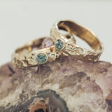 Raw texture ring with sapphire