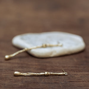 Asymmetric boney branch earrings