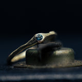 Raw gold ring with buried parti sapphire