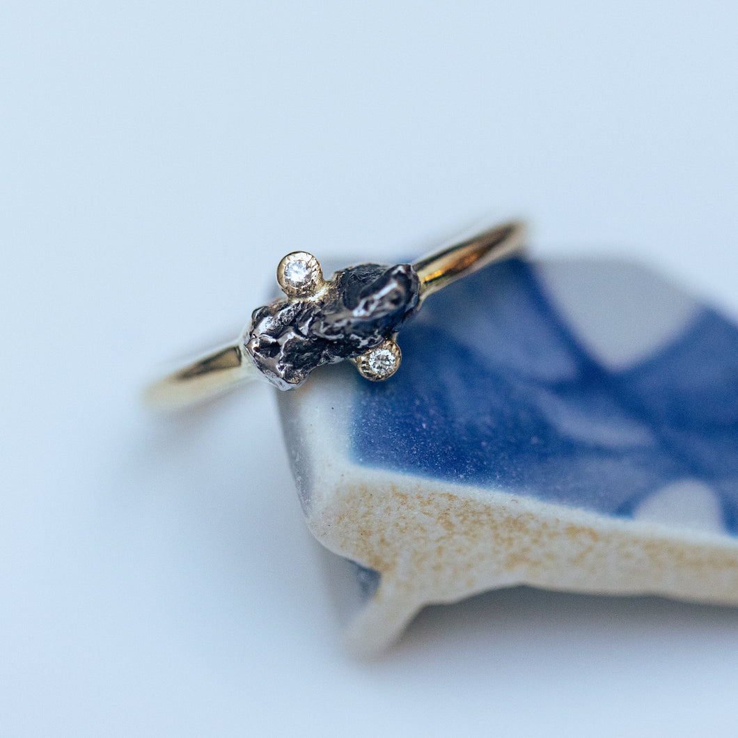 Asymmetric gold ring with meteorite and diamonds