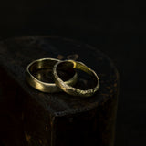 Smooth raw & chiseled wedding rings