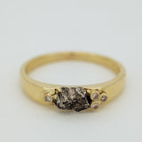 Narrowed gold ring with meteorite & diamonds