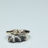 Raw concave meteorite and diamond duet