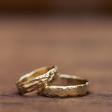 Sand & chiseled wedding rings