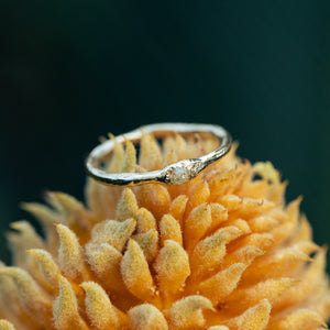 Raw ring with bright raw diamond