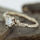 Balanced white diamonds branch ring