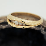 Gradual 5 stone concave ring