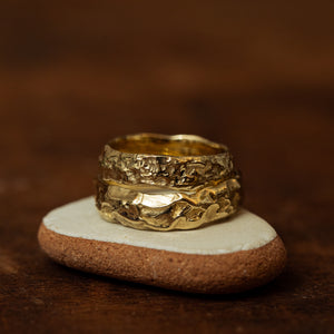 Boulder & sand wedding rings