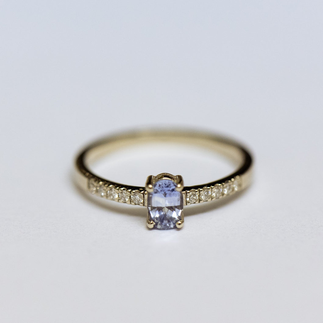Light blue sapphire & white diamonds engagement ring