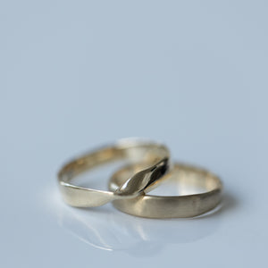 Smooth raw & Mobius wedding rings