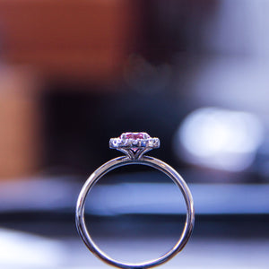 Pink halo diamond ring