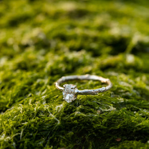 White oval diamond branch ring