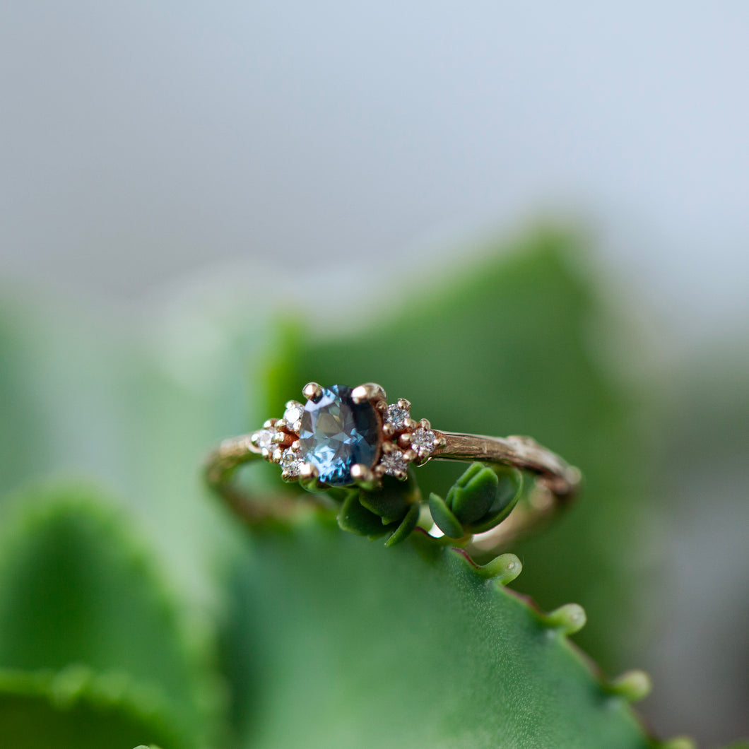 Sapphire cluster engagement ring