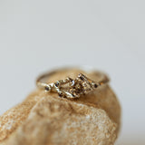 Asymmetrical spreading branch ring set with brandy diamonds