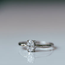 Load image into Gallery viewer, Raw white gold ring with oval white diamond
