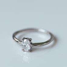 Load image into Gallery viewer, Raw white gold ring with oval white diamond
