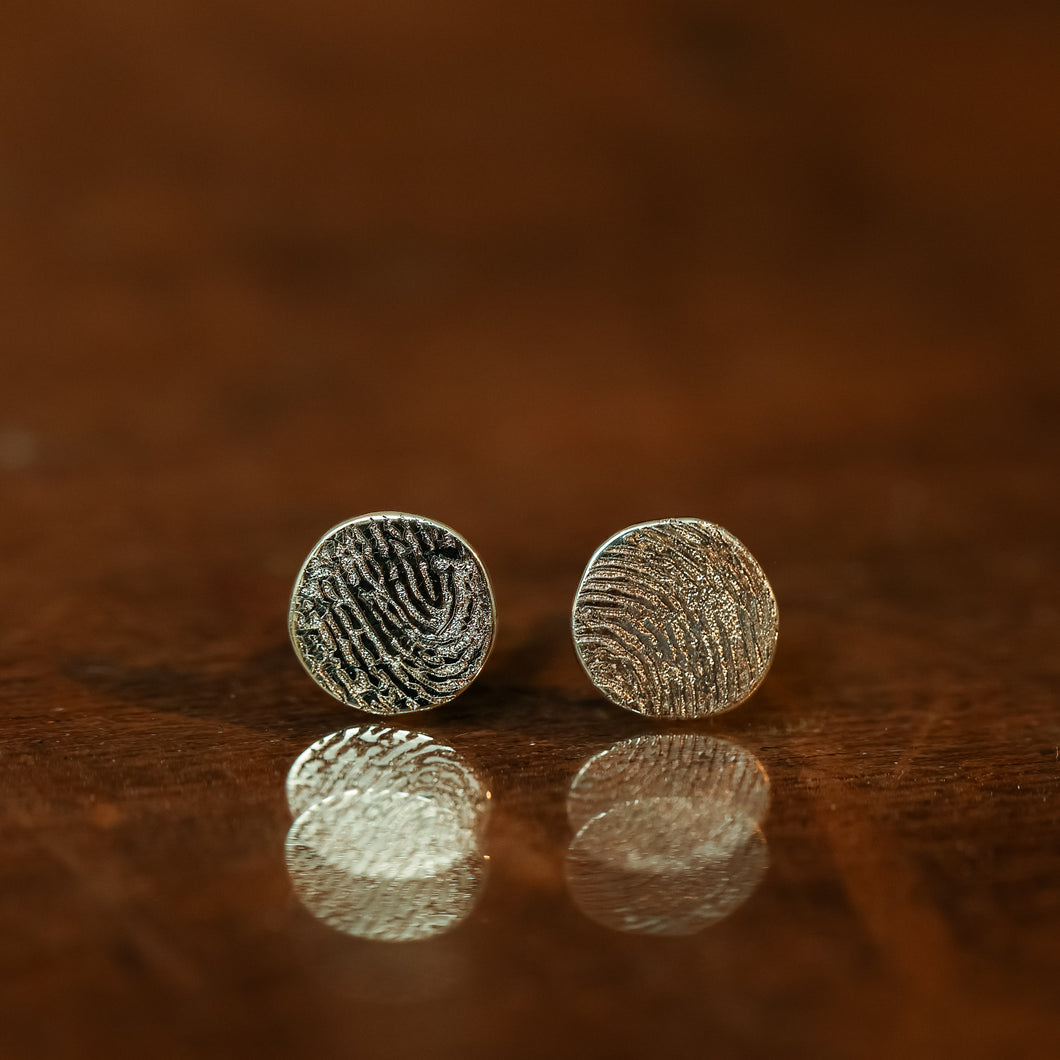 Round fingerprints stud earrings