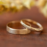 Duo of classic & raw wedding rings