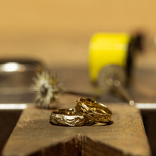 Load image into Gallery viewer, Boulder &amp; sand wedding rings
