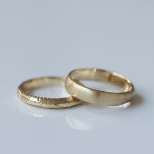 Smooth raw &  high faceted gold wedding rings