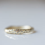 Raw ring with scatterd diamonds