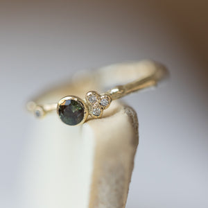 Asymmetrical branch ring with changing colors sapphire