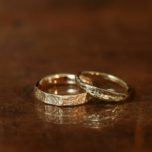 Rock & concave wedding rings