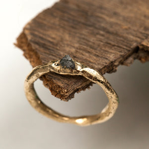 Raw gold ring with raw diamond